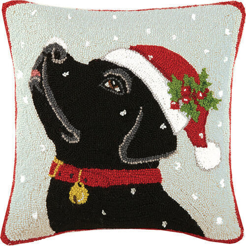 Black Lab with Santa Hat looking up at the snow Hook Pillow