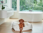 Load image into Gallery viewer, Dog Image in White Faux Fur Scoop Shaped Dog Bed from Bowsers in 4 sizes
